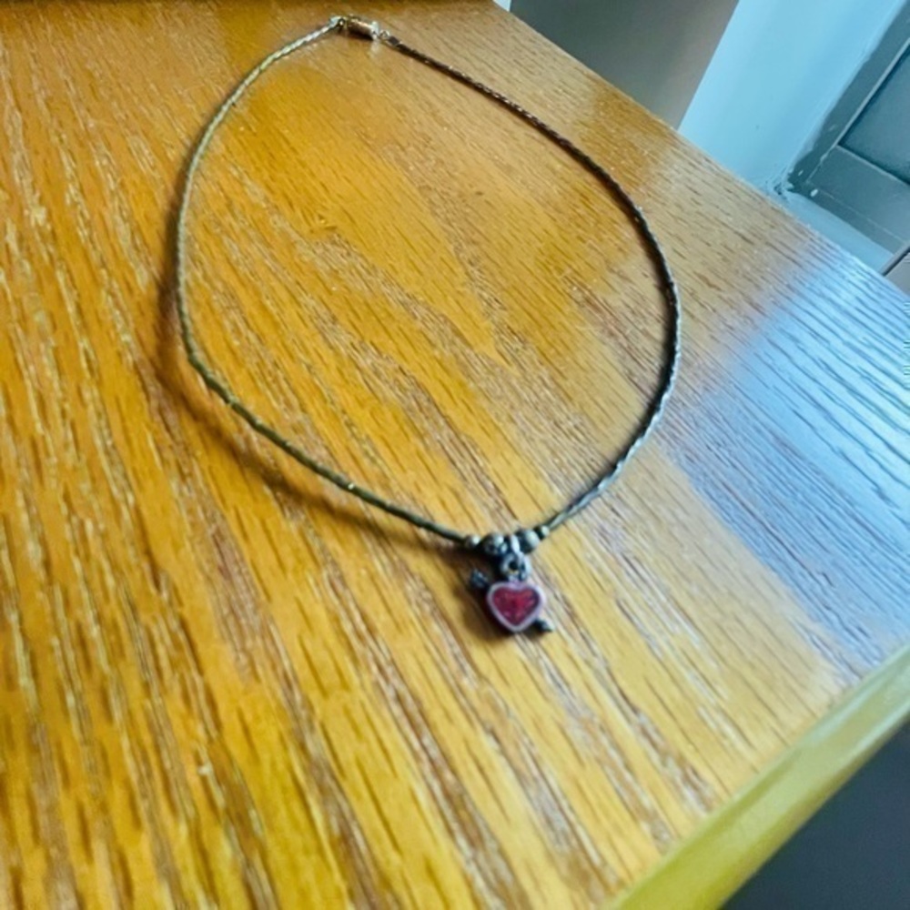 Silver arrow through the heart necklace ❤️